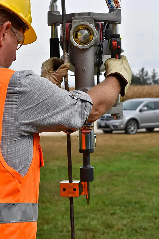 Close-up of a Rhino gas post driver in the field